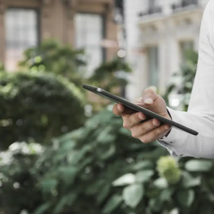 unrecognizable-businessman-browsing-tablet.jpg