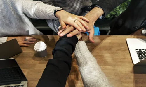 diverse-people-stacking-hands-together.jpg