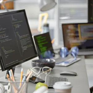computer-monitor-with-code-lines-office-setup.jpg